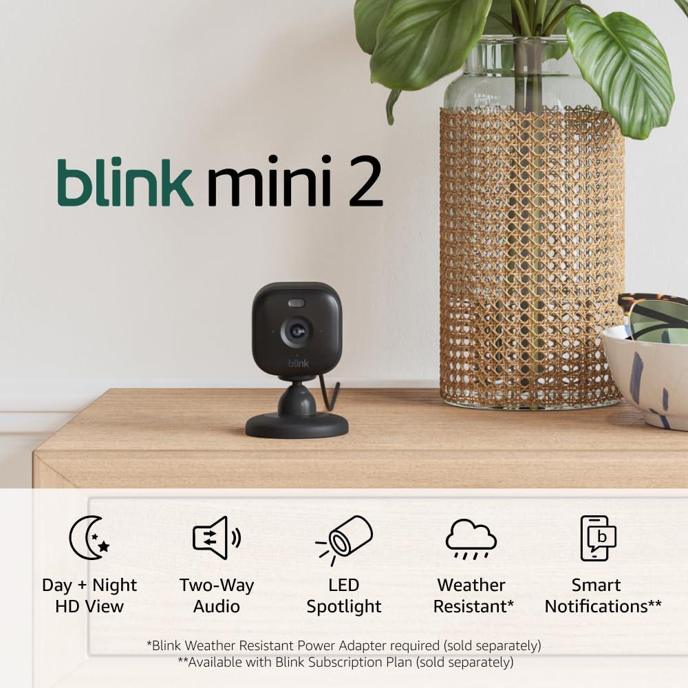 Blink Mini 2 with 1-Year Plus Subscription, 2 Cameras (White) — Plug-in smart security camera, HD night view in color, built-in spotlight, motion detection, Works with Alexa(Black)