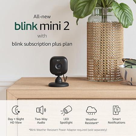 Blink Mini 2 with 1-Year Plus Subscription, 2 Cameras (White) — Plug-in smart security camera, HD night view in color, built-in spotlight, motion detection, Works with Alexa(Black)